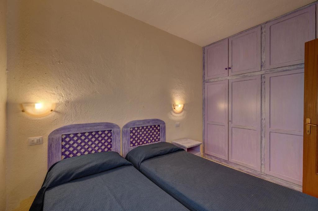 Ein Bett oder Betten in einem Zimmer der Unterkunft Baia de Bahas Residence