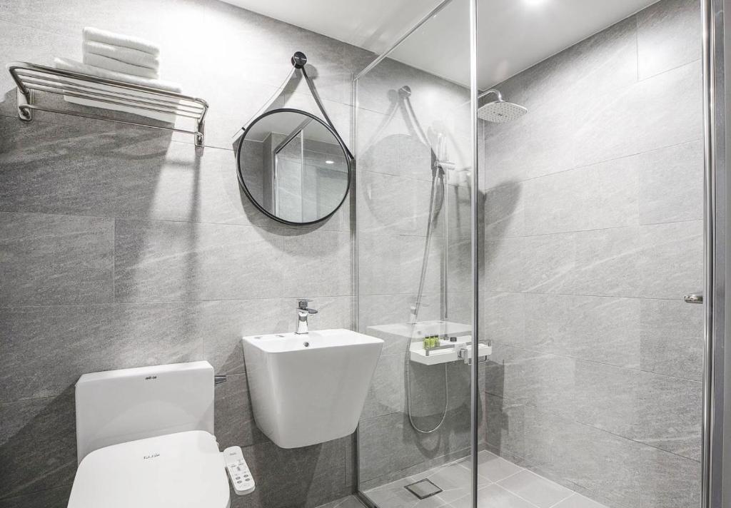 Koupelna v ubytování JJ Hotel