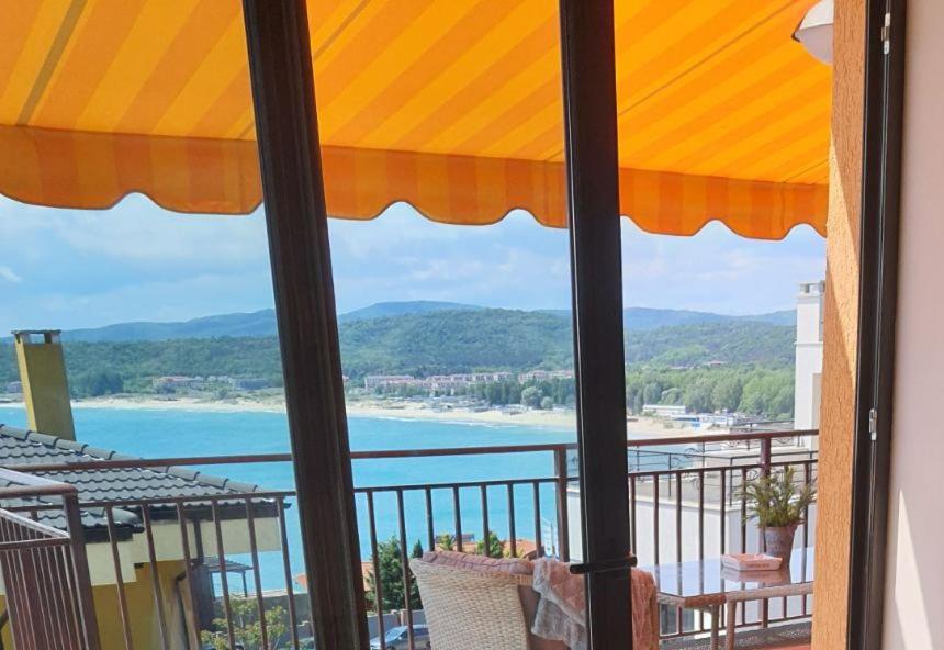 a view of the ocean from a balcony at Apartments Provence in Sozopol
