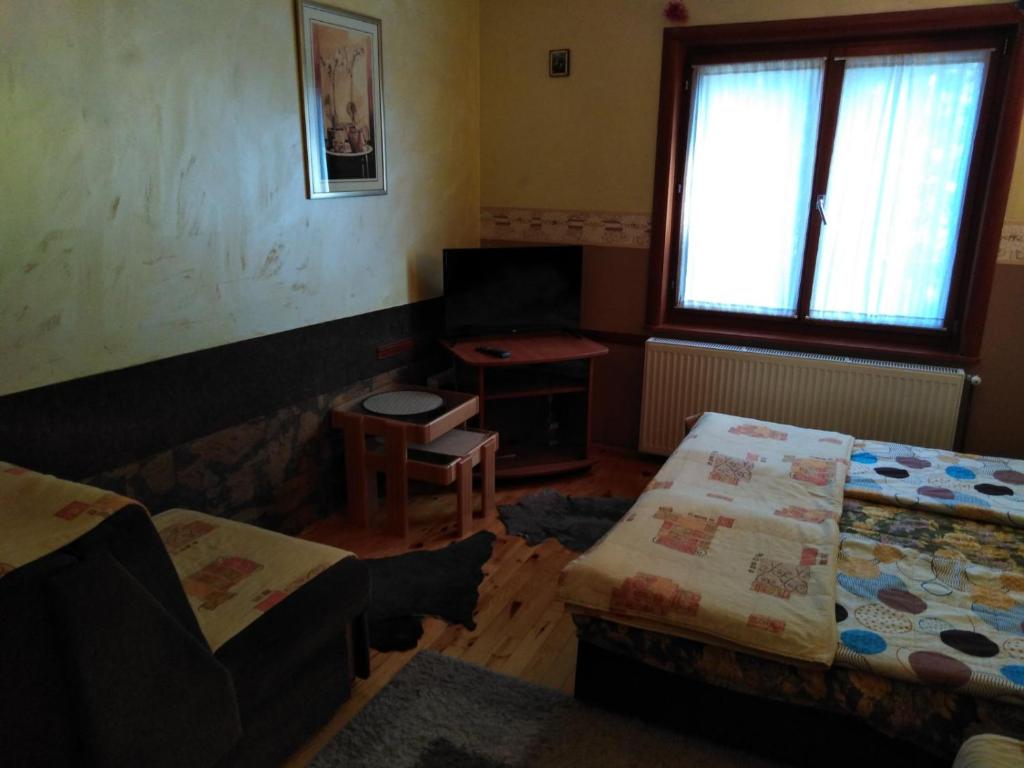 Postel nebo postele na pokoji v ubytování Smeštaj Popović