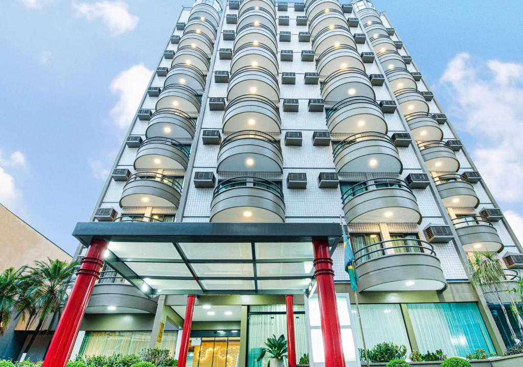 a building with balconies on the side of it at Hotel Nacional Inn Cambuí Campinas Residence in Campinas