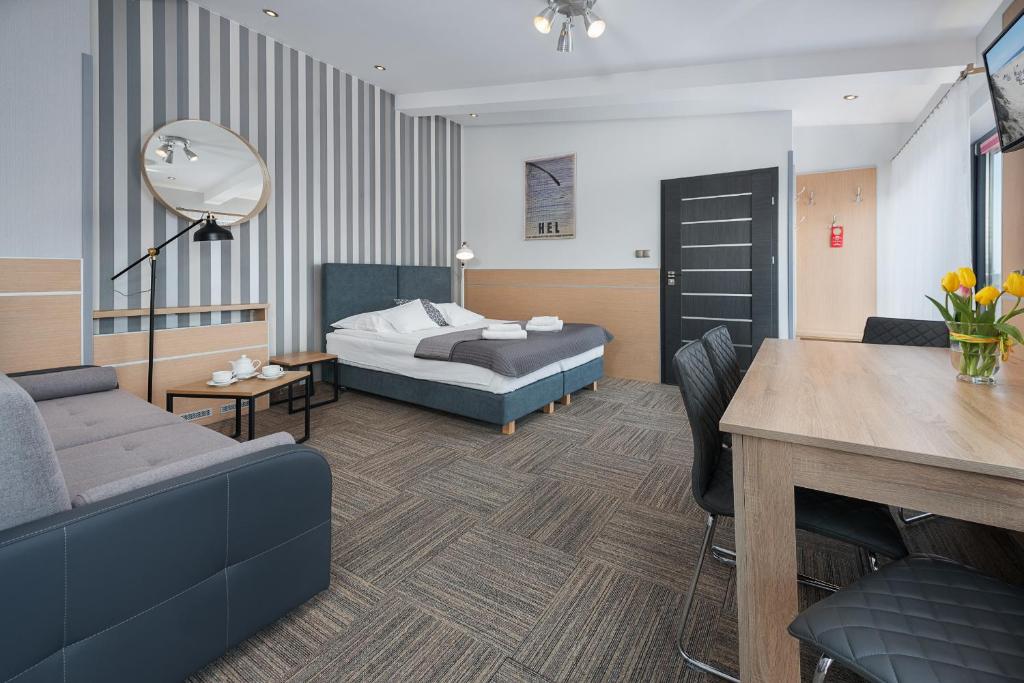 Postel nebo postele na pokoji v ubytování Hotel Rejs