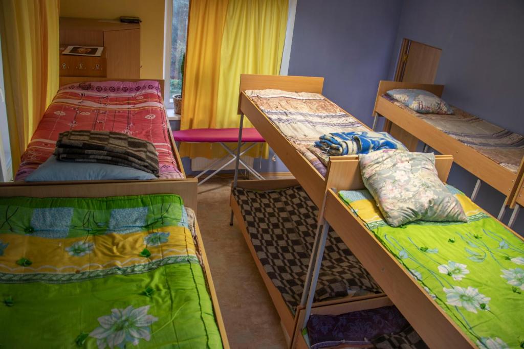 Postel nebo postele na pokoji v ubytování Arcobaleno Home