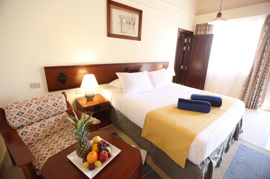 Кровать или кровати в номере Nuweiba Club Resort