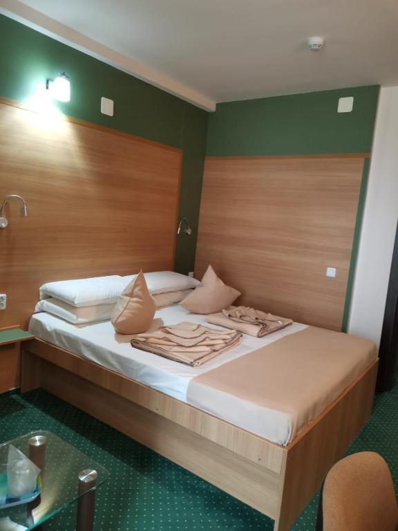 Postel nebo postele na pokoji v ubytování Delta Palace