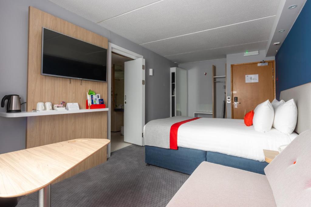 Postel nebo postele na pokoji v ubytování Holiday Inn Express - Glasgow - City Ctr Theatreland by IHG