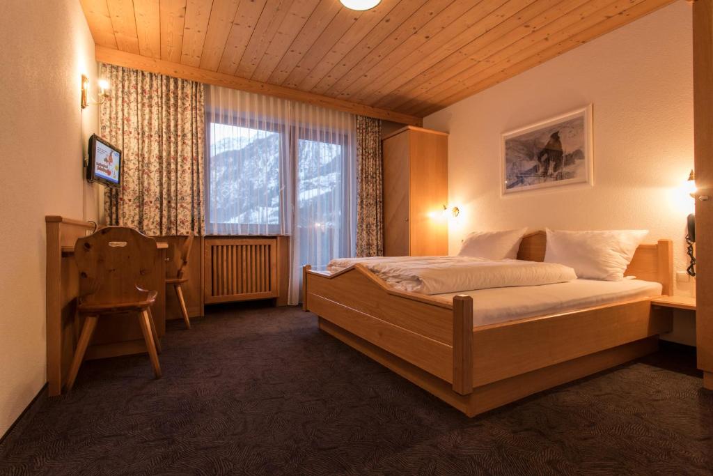 Postel nebo postele na pokoji v ubytování Hotel Hafele