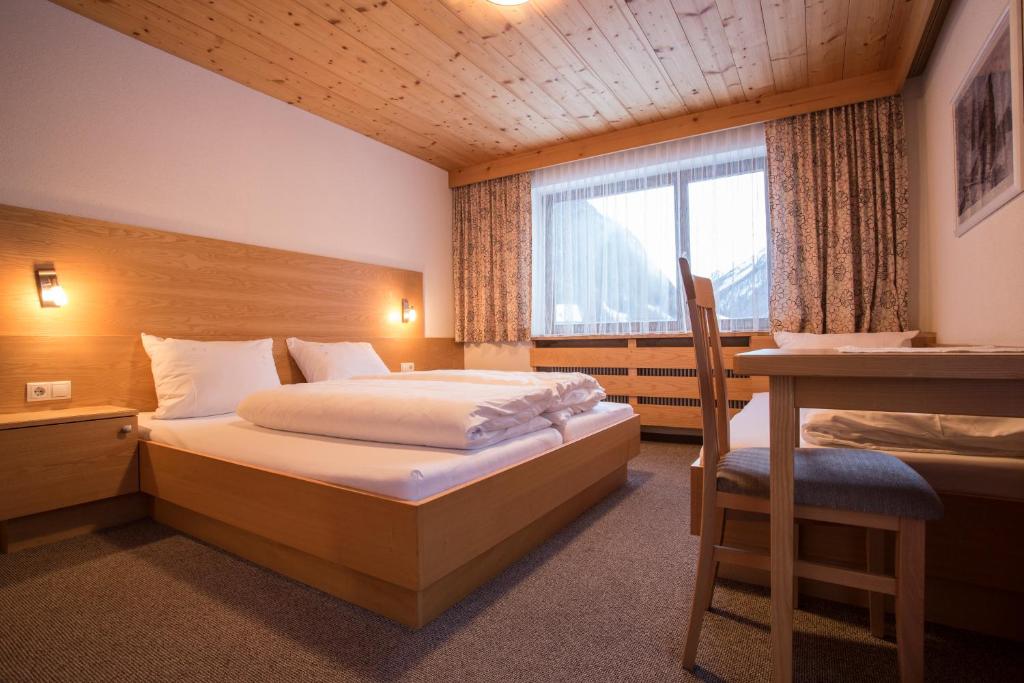 Postel nebo postele na pokoji v ubytování Hotel Hafele