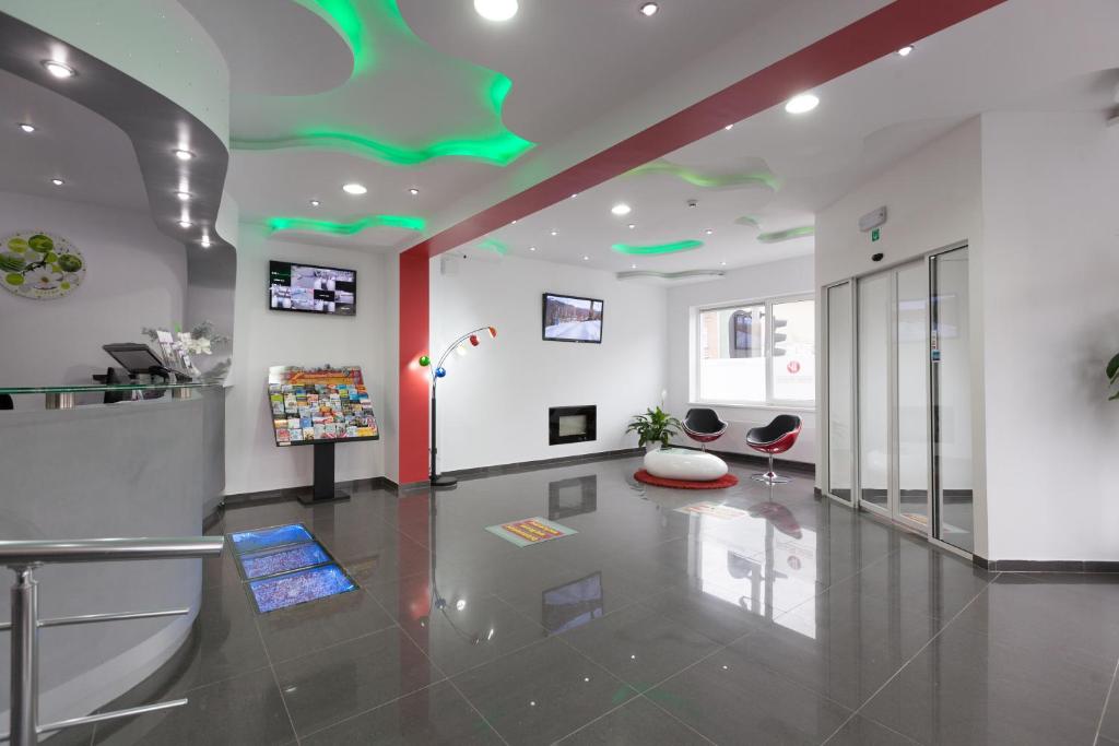 TV a/nebo společenská místnost v ubytování Hotel Phenix