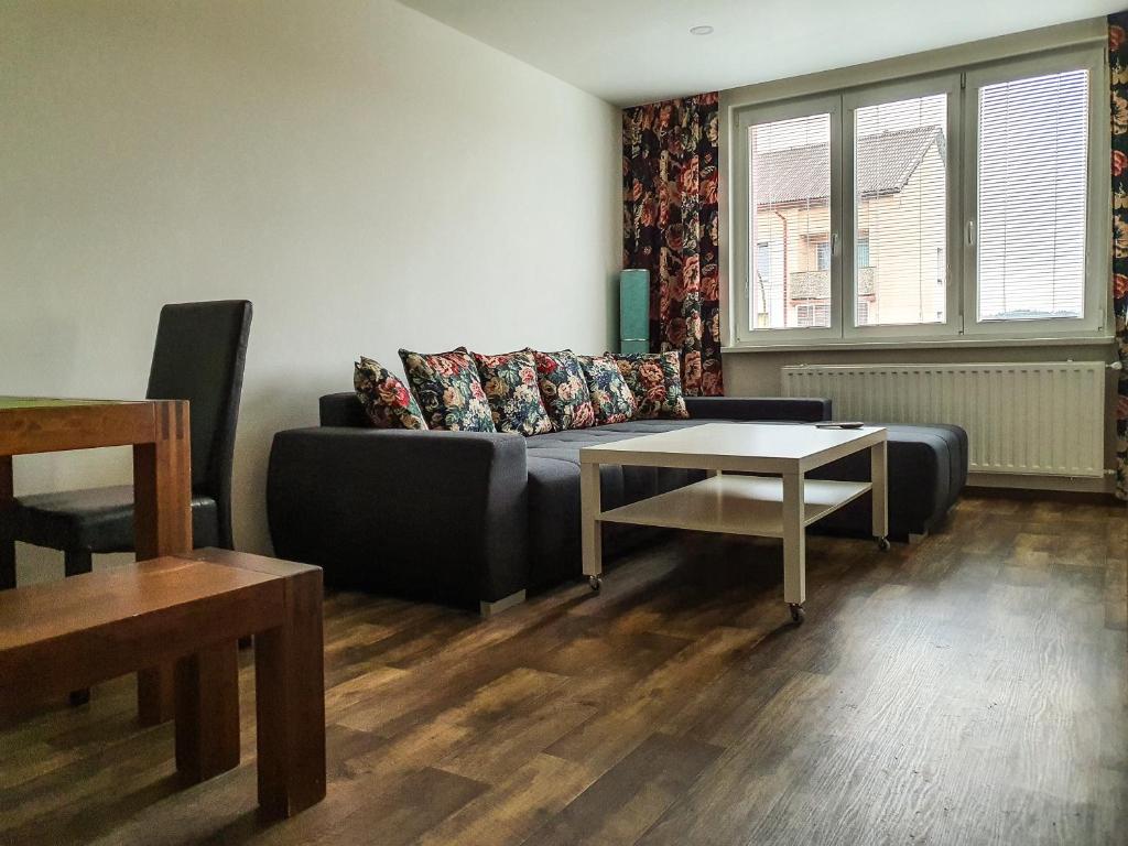 Postel nebo postele na pokoji v ubytování Apartmány SCHMIEDEBERG u KLÍNOVCE