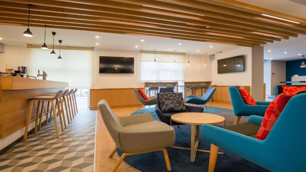 TV a/nebo společenská místnost v ubytování Holiday Inn Express - Ljubljana by IHG