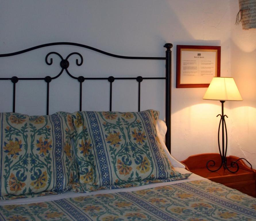 Cama o camas de una habitación en Pension el Portillo