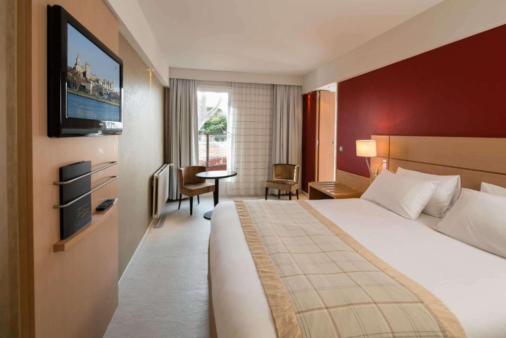 Postel nebo postele na pokoji v ubytování Best Western Plus Le Lavarin