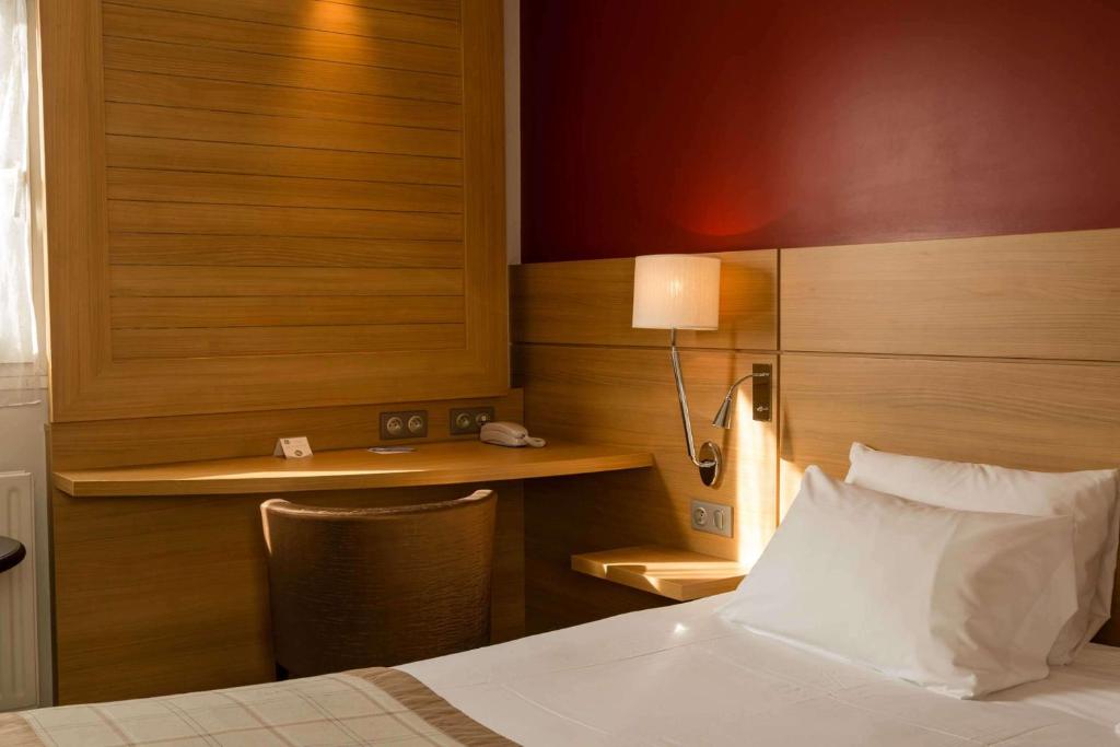 Postel nebo postele na pokoji v ubytování Best Western Plus Le Lavarin