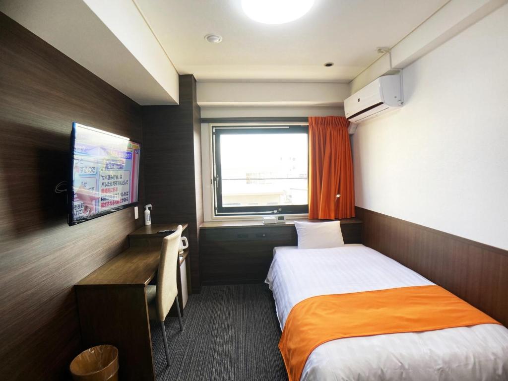 TV a/nebo společenská místnost v ubytování High Set HOTEL SHIZUOKA Inter