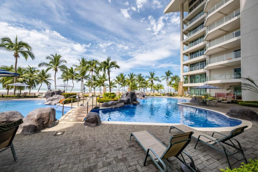 Bazén v ubytování Best in Jaco Condos at Diamante del Sol nebo v jeho okolí
