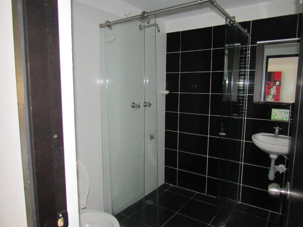 Koupelna v ubytování Hotel Murano Medellín