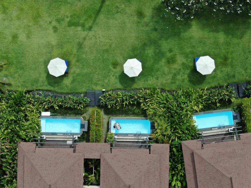 Bazén v ubytování Pullman Phuket Panwa Beach Resort nebo v jeho okolí
