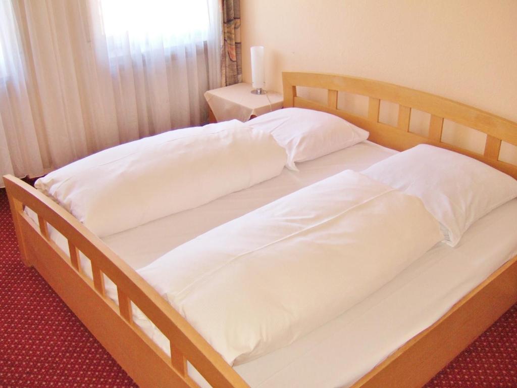 Postel nebo postele na pokoji v ubytování Landgasthof Sonne