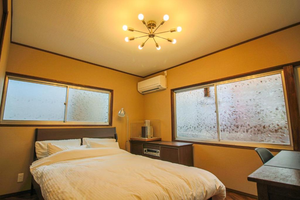 Posteľ alebo postele v izbe v ubytovaní 縁 鷺洲 (En Sagisu) OF1