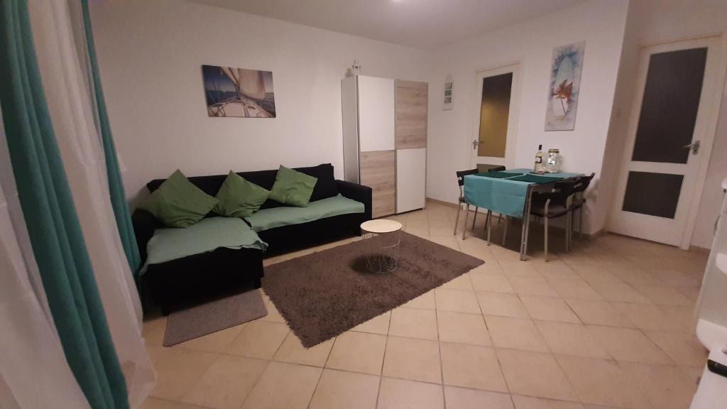 Posezení v ubytování Onix - Orfű Apartman