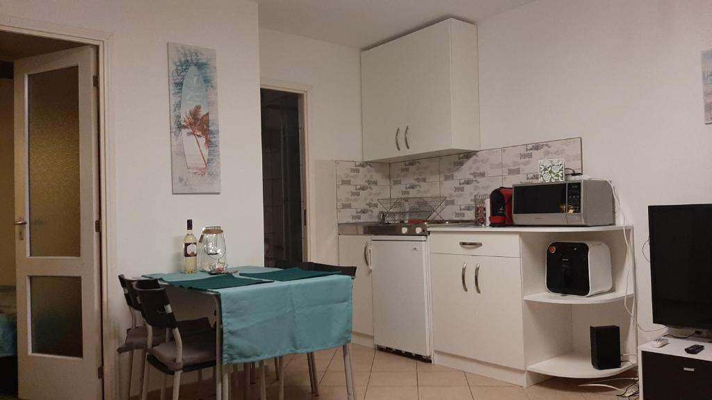 Kuchyň nebo kuchyňský kout v ubytování Onix - Orfű Apartman