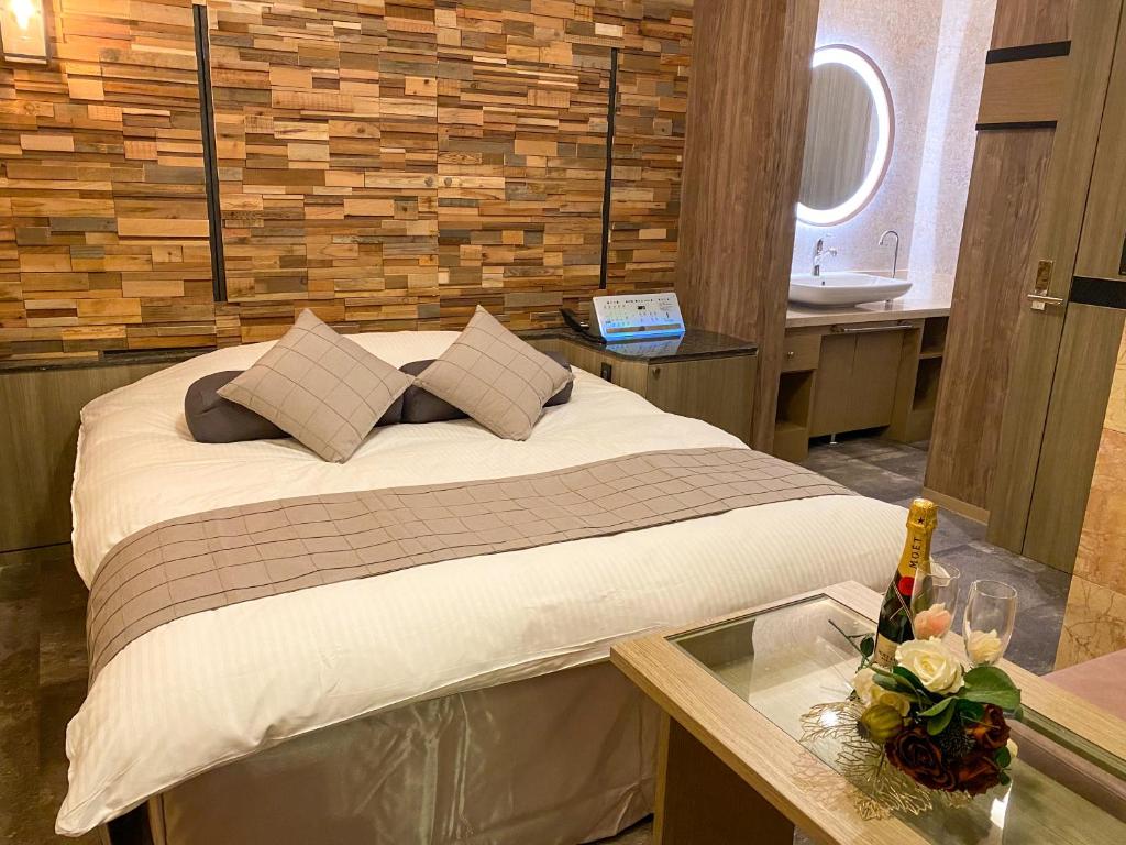 Postel nebo postele na pokoji v ubytování Hotel Venus Garden(Adult Only)