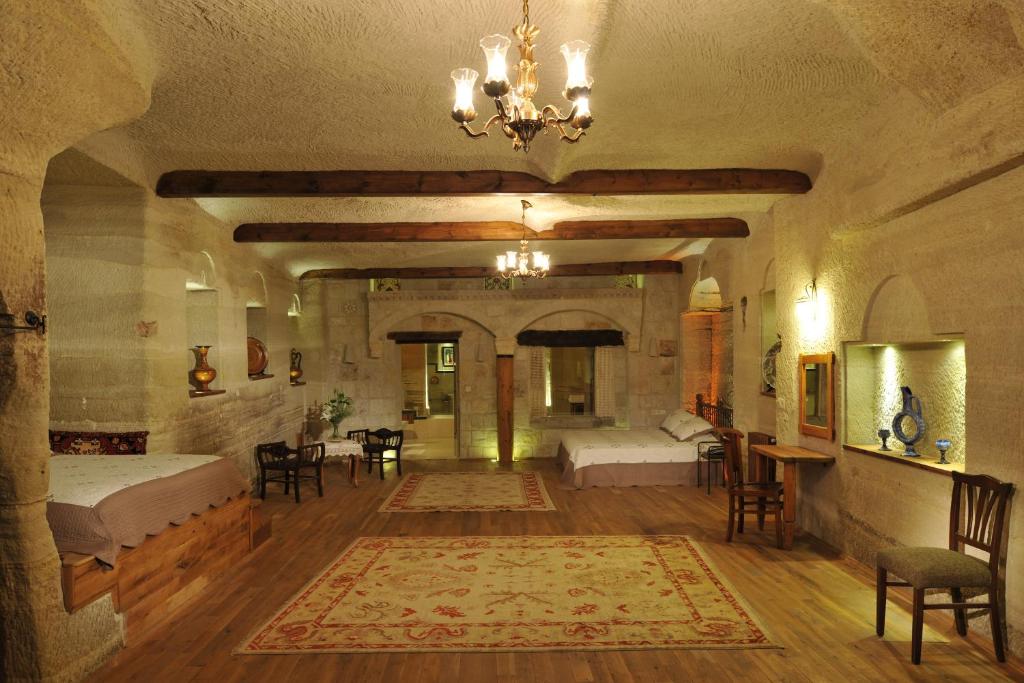 Postel nebo postele na pokoji v ubytování Aydinli Cave Hotel