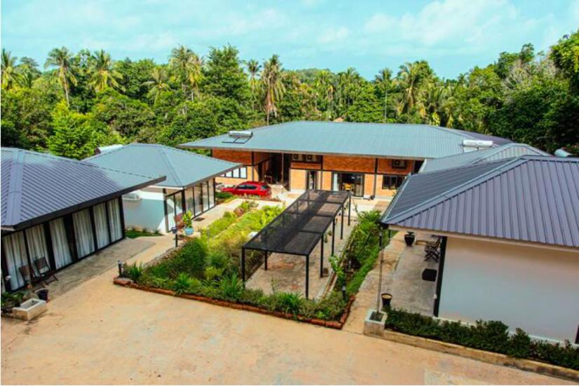an aerial view of a house with a garage at S`ekar Pinang Langkawi in Pantai Cenang