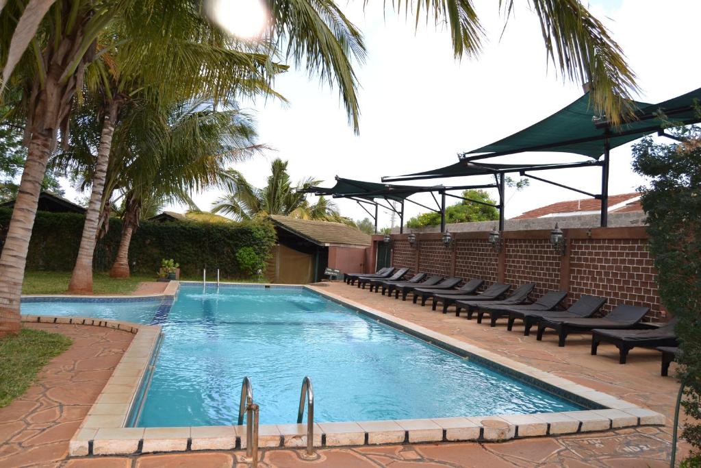 The swimming pool at or near Impala Safari Lodge