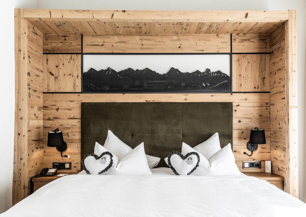 Postel nebo postele na pokoji v ubytování Hotel Klosterbräu