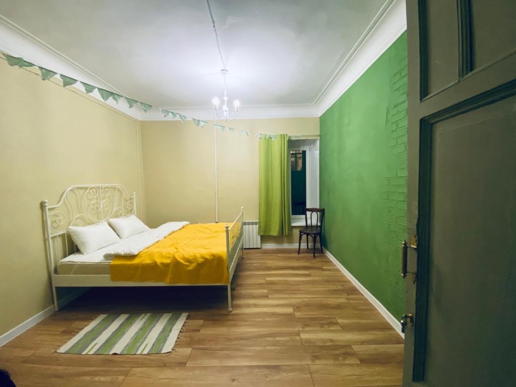 Posteľ alebo postele v izbe v ubytovaní The Roomers