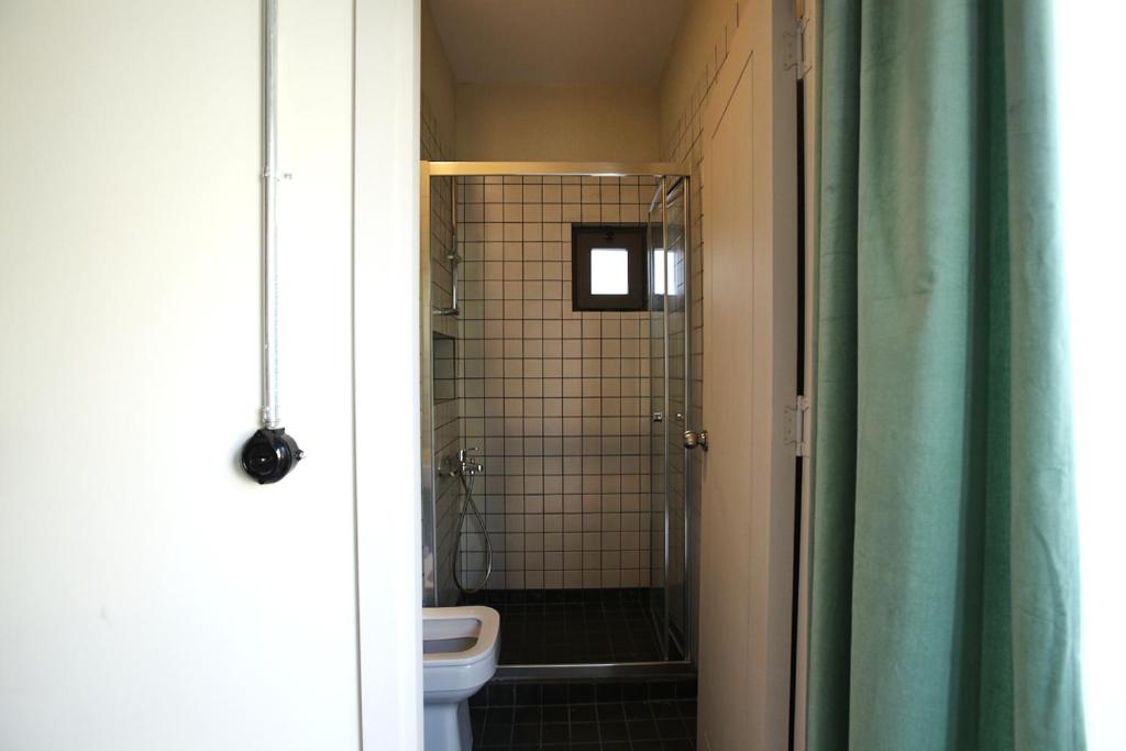 Koupelna v ubytování FLANEUR HOSTEL