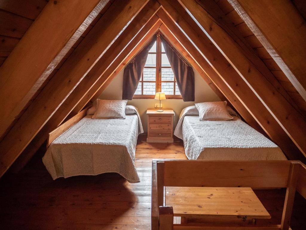 Postel nebo postele na pokoji v ubytování Peira Blanca Hotel Gastronómico