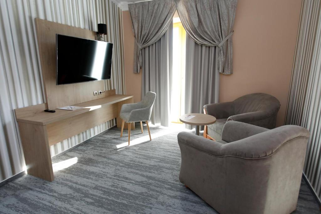 TV a/nebo společenská místnost v ubytování Wellness Hotel Laroba