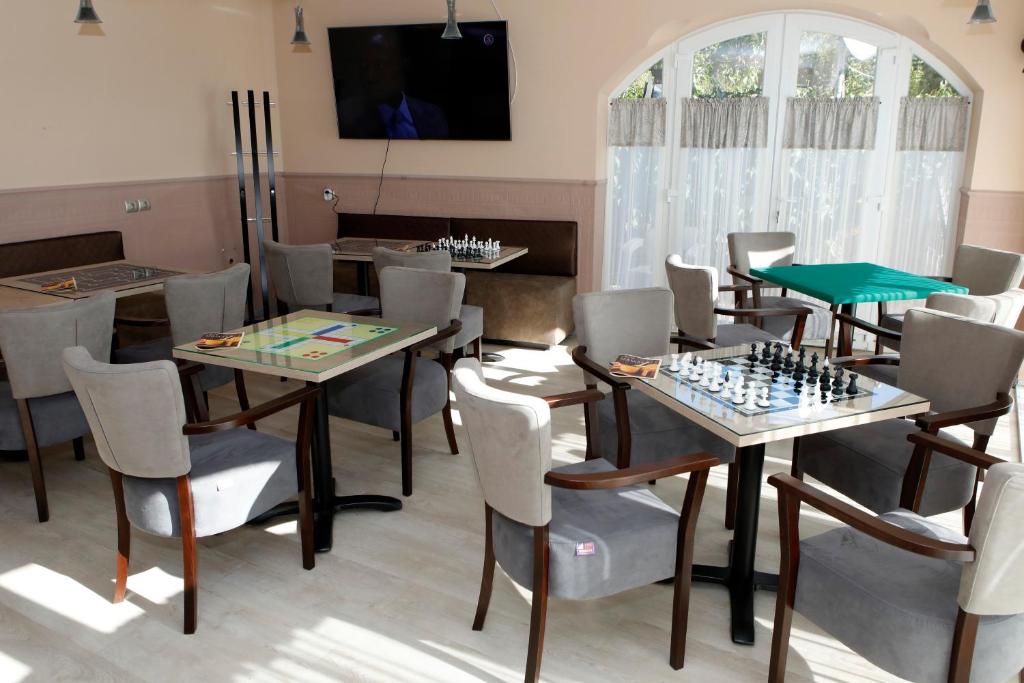 TV a/nebo společenská místnost v ubytování Wellness Hotel Laroba
