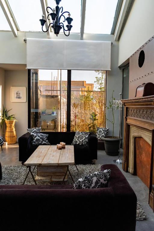 Posezení v ubytování Sinanis city home