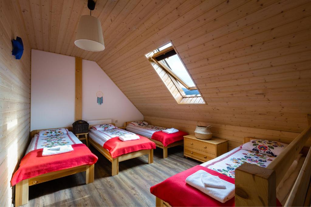 Posteľ alebo postele v izbe v ubytovaní Apartamenty Stara Morawa - Zew Natury