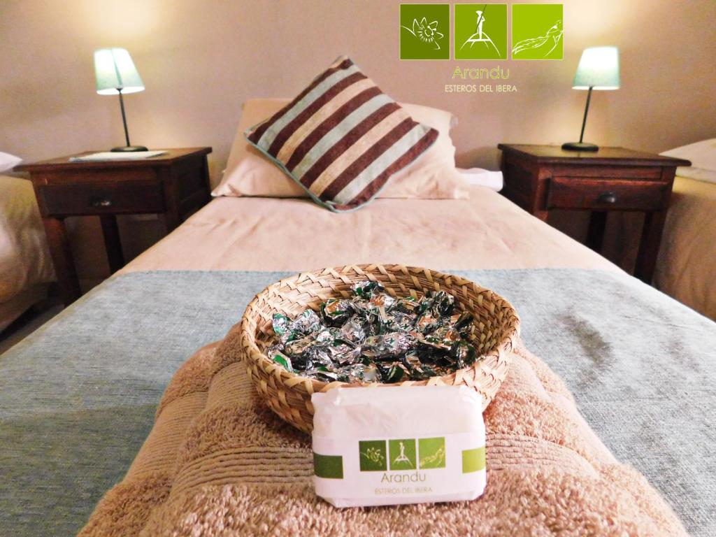 Postel nebo postele na pokoji v ubytování Arandu ecolodge
