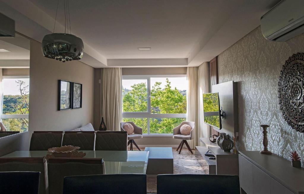 Jardins de Gramado 102 - 2 Suítes e Lavabo no Centro  Jardins de Gramado 102 - 2 Suítes e Lavabo no Centro