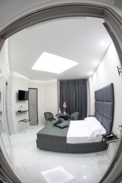 TV a/nebo společenská místnost v ubytování Hotel Trionfal