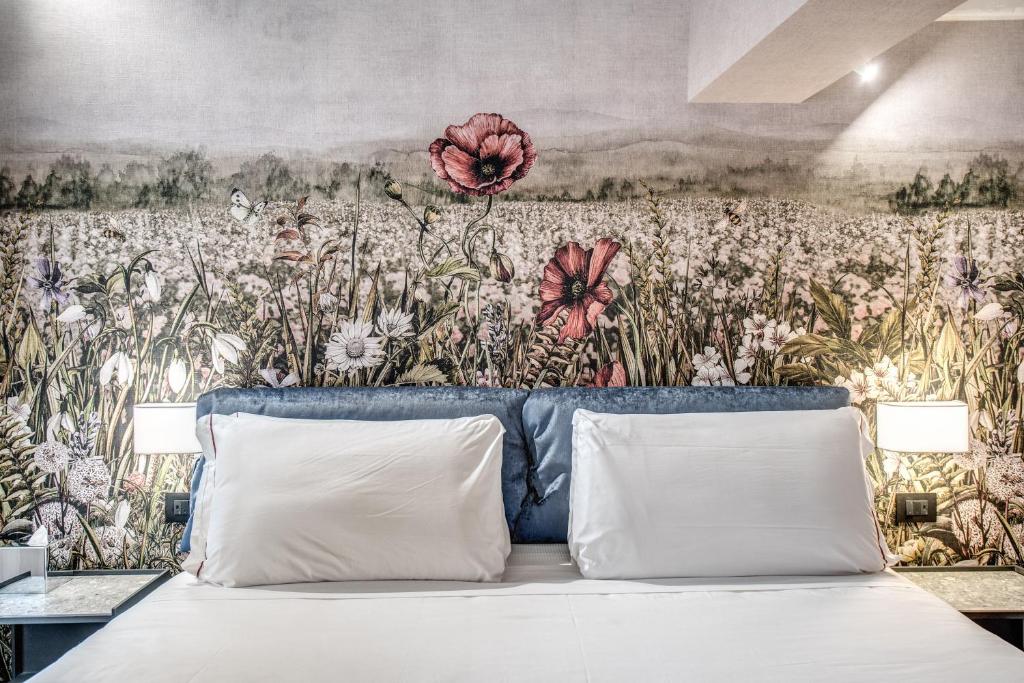 Voodi või voodid majutusasutuse PAX hotel toas