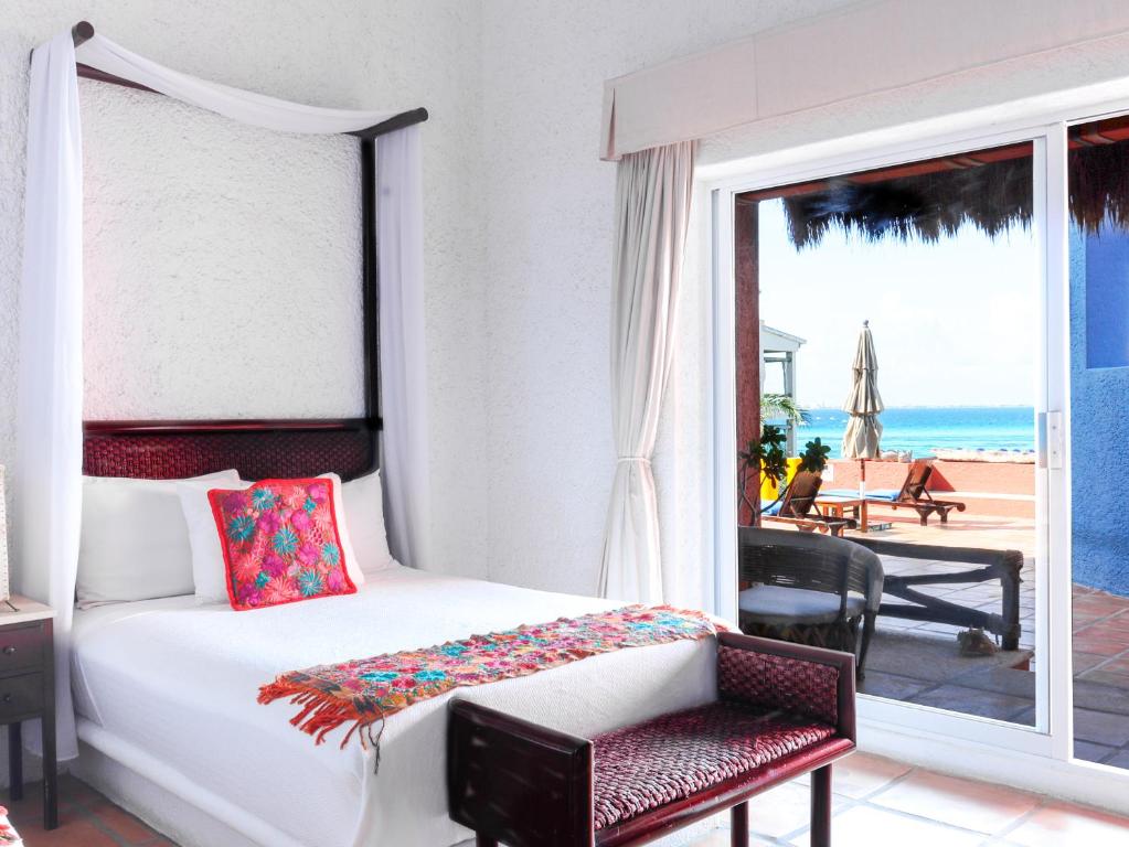 Postel nebo postele na pokoji v ubytování Casa de los Sueños Hotel Boutique
