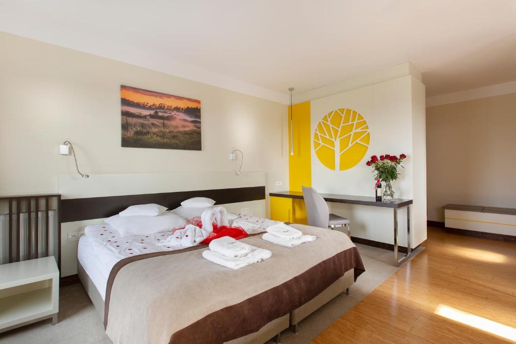 Posteľ alebo postele v izbe v ubytovaní Villa Buki Pokoje & SPA