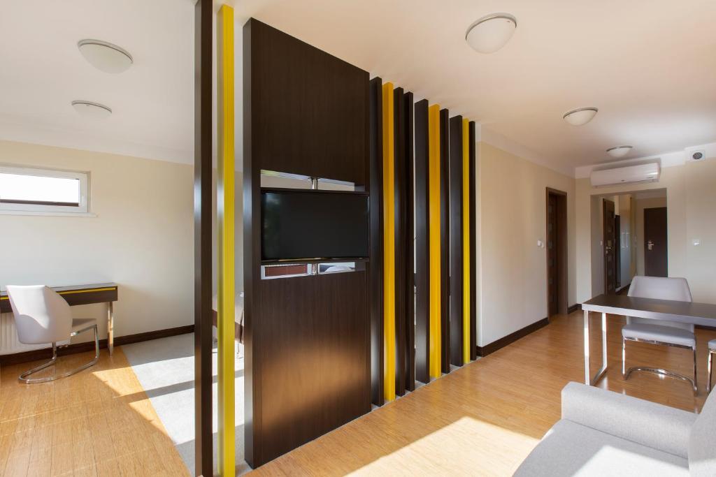 Posedenie v ubytovaní Villa Buki Pokoje & SPA