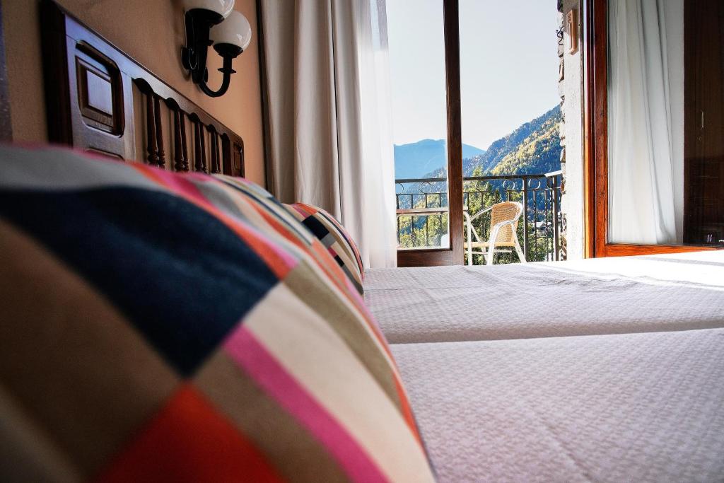 Postel nebo postele na pokoji v ubytování Hotel La Burna Panoràmic