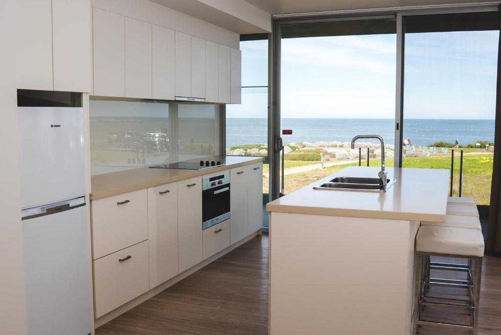 Kuchyň nebo kuchyňský kout v ubytování Wyndham Resort Torquay