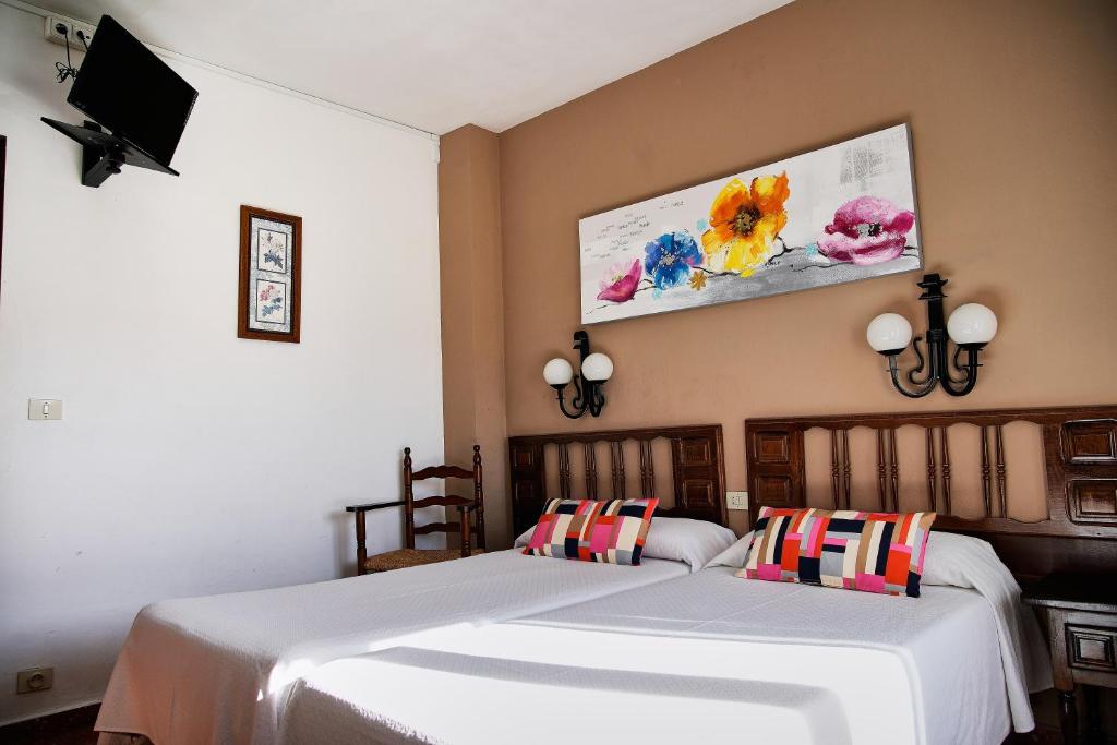 Postel nebo postele na pokoji v ubytování Hotel La Burna Panoràmic