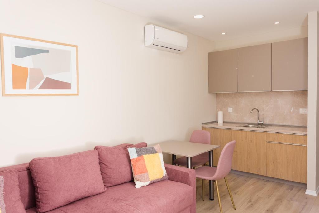 Kuchyň nebo kuchyňský kout v ubytování Urban Residence Apartments