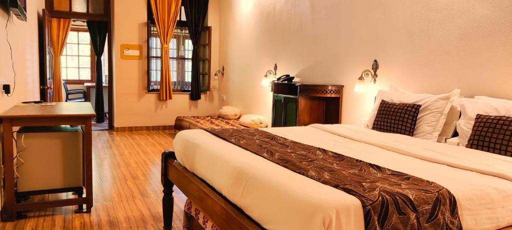 Postel nebo postele na pokoji v ubytování Hotel Mount View Heritage